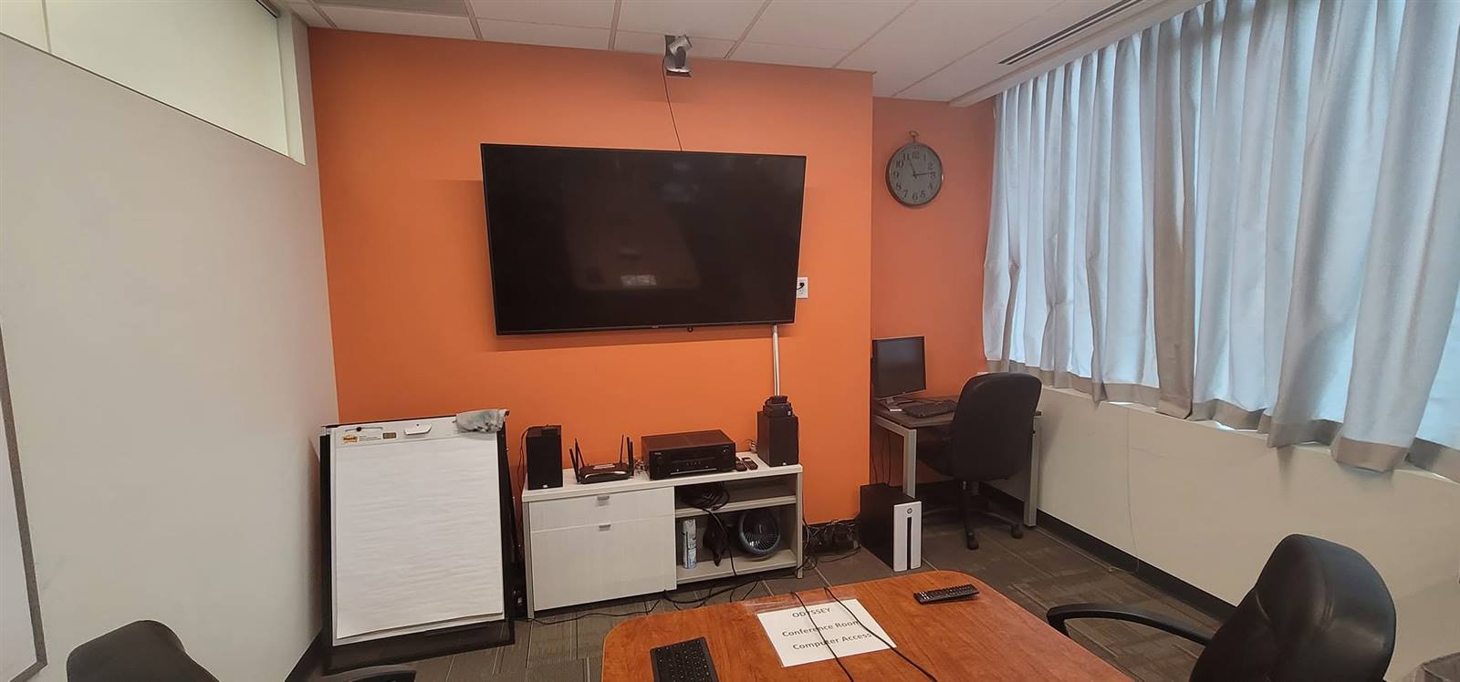 Commercial office repaint with orange accent wall